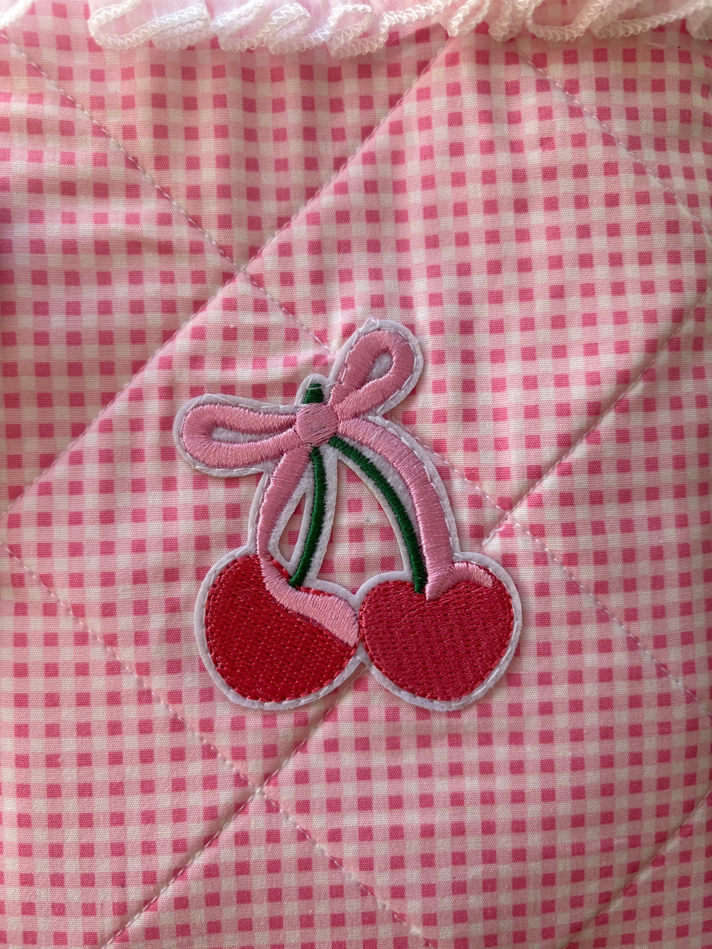 Pink and white gingham quilted kindle sleeve handmade with cherry appliqué