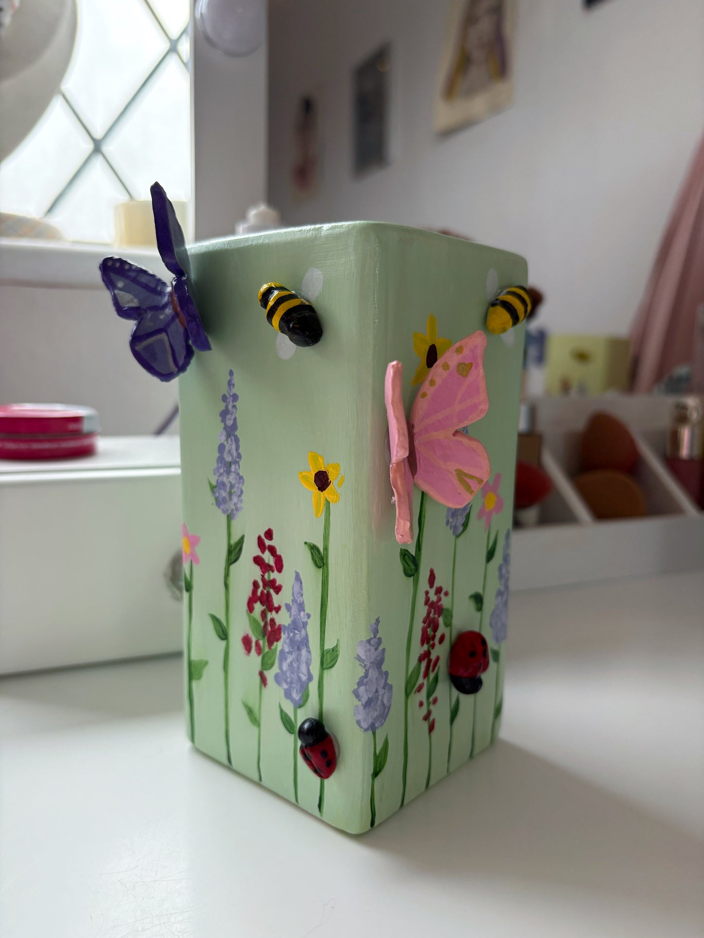 3D pastel wildlife vases, with hand painted wild flowers, clay bees, butterflies and ladybug, spring vase
