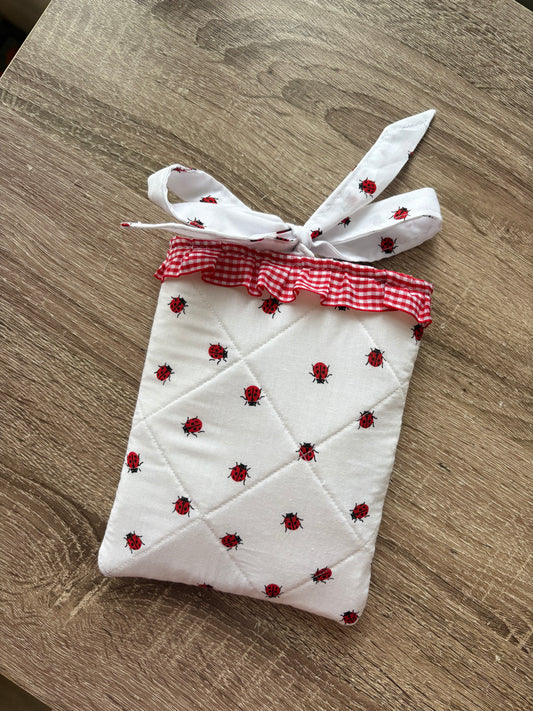 Red and white ladybug quilted kindle sleeve with red gingham frill