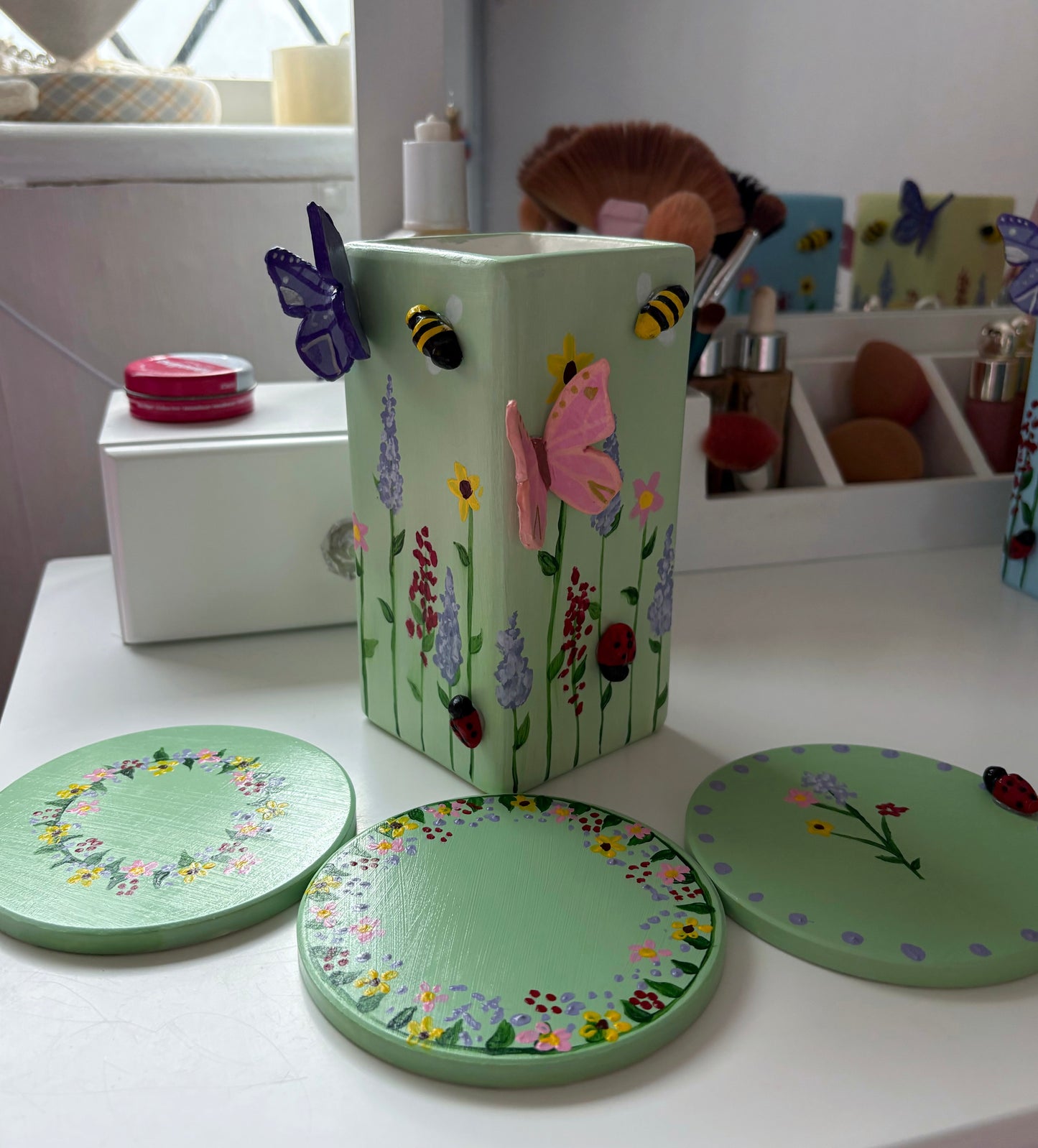 3D pastel wildlife vases with matching coasters. Hand painted wild flowers, clay bees, butterflies and ladybug, spring ceramic set.