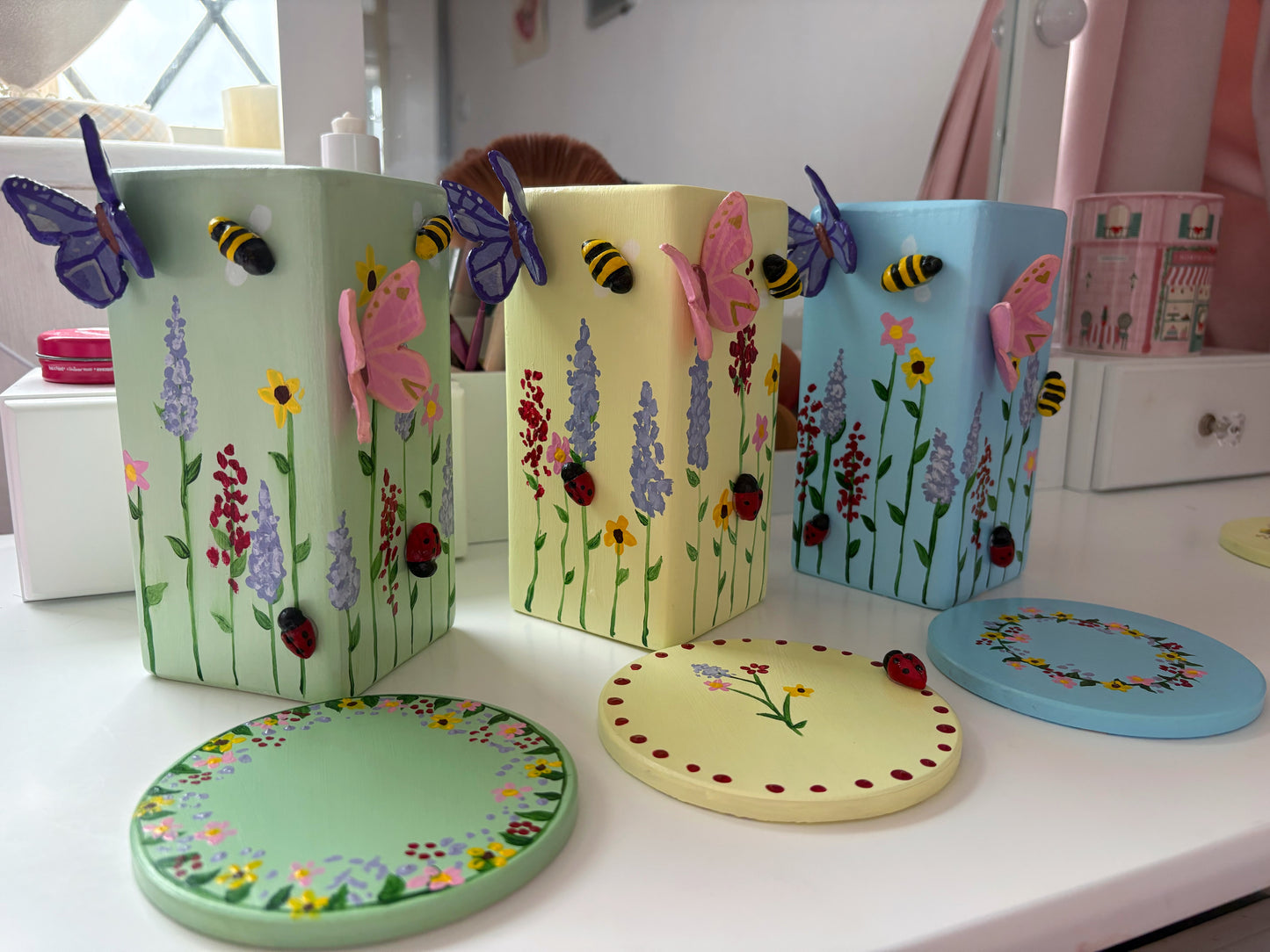 3D pastel wildlife vases with matching coasters. Hand painted wild flowers, clay bees, butterflies and ladybug, spring ceramic set.