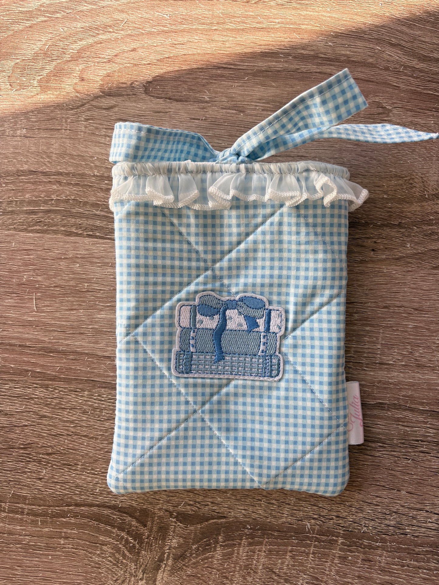 Blue and white gingham quilted kindle sleeve handmade with book appliqué