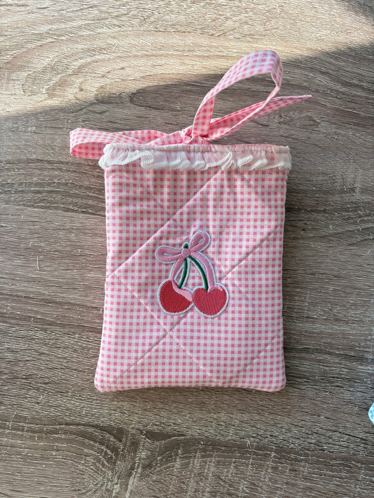 Pink and white gingham quilted kindle sleeve handmade with cherry appliqué