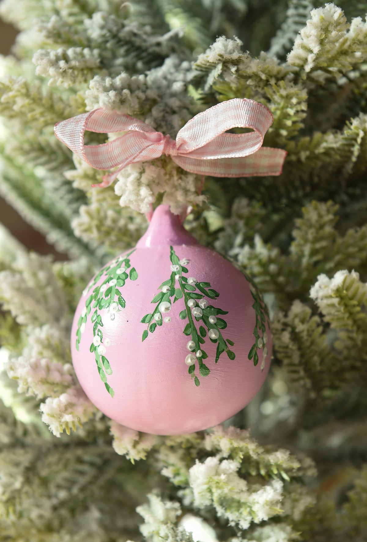 Set of three hand painted christmas baubles in pink, blue and red