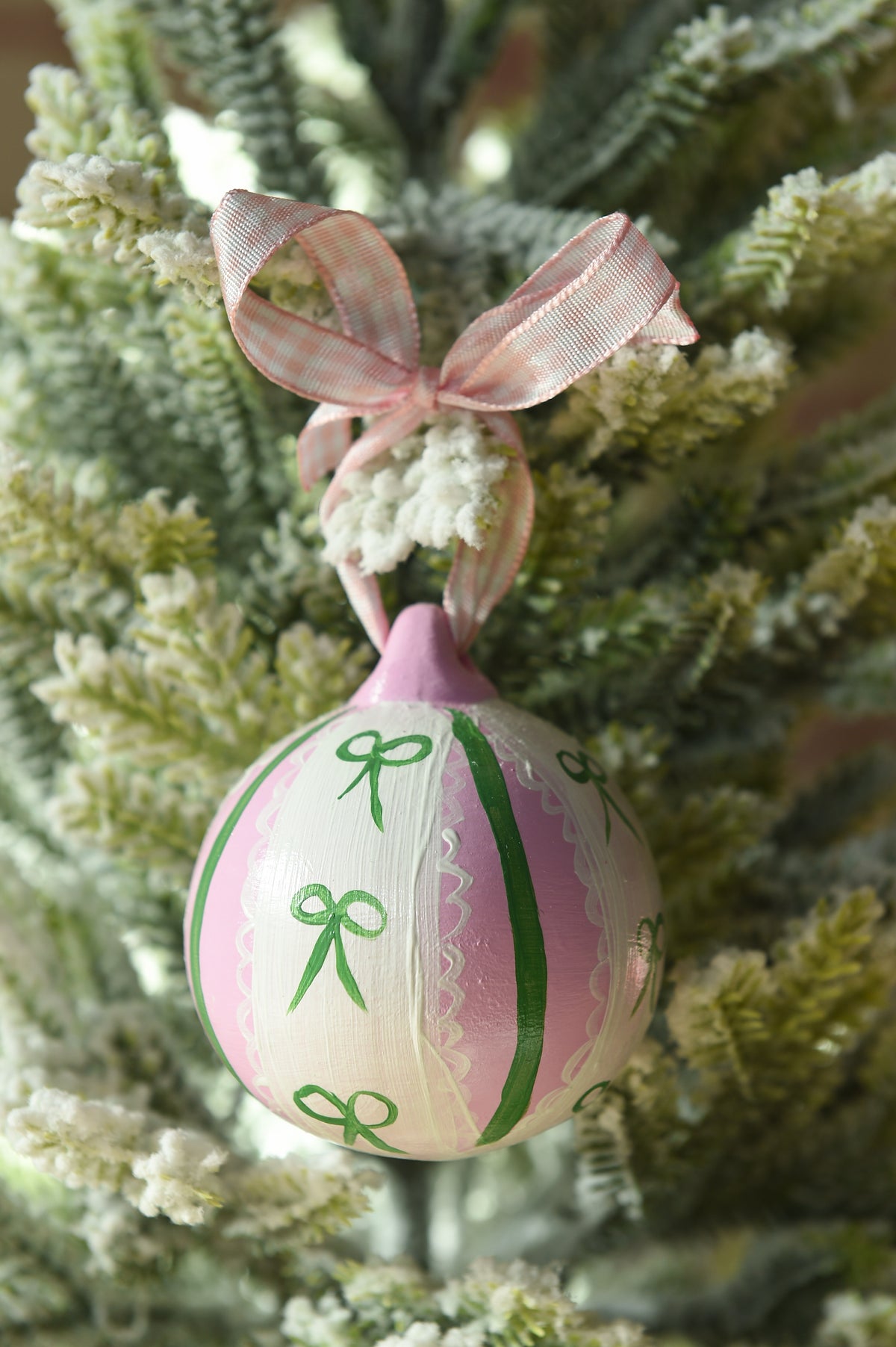 Set of three hand painted christmas baubles in pink, blue and red