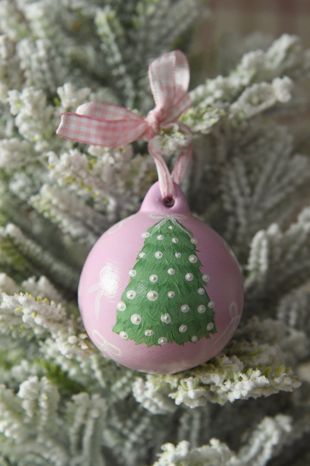 Set of three hand painted christmas baubles in pink, blue and red