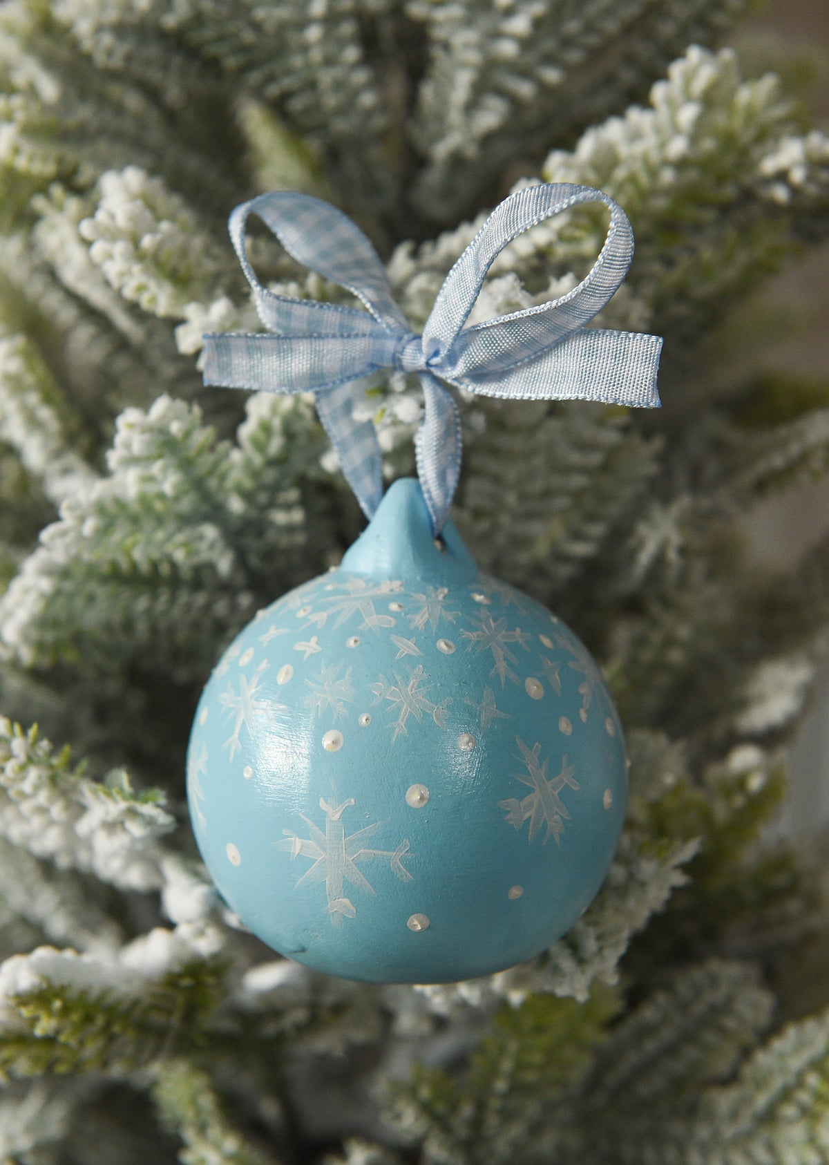 Set of three hand painted christmas baubles in pink, blue and red